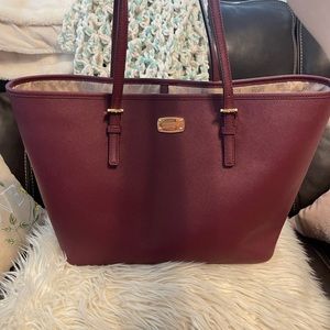 Michael Kors Merlot colored leather Jet Set Travel Tote, Brand new with tags